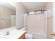 Bathroom featuring tile floors, single sink, and shower-tub combo at 9319 W Crown King Rd, Tolleson, AZ 85353