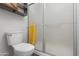 Bathroom featuring a toilet and a glass enclosed shower with metal trim at 9621 E Calgary Ave, Sun Lakes, AZ 85248