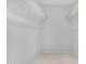 Walk-in closet with white walls and carpeted floor at 9621 E Calgary Ave, Sun Lakes, AZ 85248