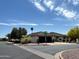 Charming single-story home featuring a two-car garage and desert landscaping at 9621 E Calgary Ave, Sun Lakes, AZ 85248