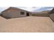 Expansive vacant backyard with beige fencing and mountain views at 10022 S 37Th Ave, Laveen, AZ 85339
