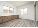 Bright kitchenette area offering wood cabinets, light countertops, and plenty of natural light at 10022 S 37Th Ave, Laveen, AZ 85339