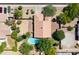 Aerial view of a beautiful home with a private pool and lush landscaping at 108 E Horseshoe Ave, Gilbert, AZ 85296