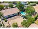 Lovely single-story home with a private backyard, complemented by a refreshing swimming pool and desert landscaping at 108 E Horseshoe Ave, Gilbert, AZ 85296