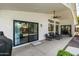 Spacious covered back patio perfect for entertaining, with outdoor seating area at 108 E Horseshoe Ave, Gilbert, AZ 85296
