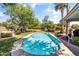 Inviting backyard pool with turquoise water, surrounded by lush greenery, offers a refreshing retreat at 108 E Horseshoe Ave, Gilbert, AZ 85296