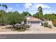 Attractive single-story home with a terracotta tile roof and well-maintained desert landscaping at 108 E Horseshoe Ave, Gilbert, AZ 85296