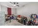 Bedroom featuring carpet flooring, ceiling fan and natural light at 13039 N 19Th Ave, Phoenix, AZ 85029