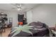 Bedroom featuring wood-look floors and ceiling fan at 13039 N 19Th Ave, Phoenix, AZ 85029