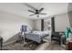 Bedroom with carpet, ceiling fan, window with curtains, and natural light at 13039 N 19Th Ave, Phoenix, AZ 85029