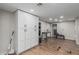 Functional storage space with white cabinets and laminate flooring, offering ample storage solutions and versatility at 13039 N 19Th Ave, Phoenix, AZ 85029