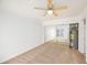 Neutral bedroom with ceiling fan and carpet, highlighted by mirrored closet doors at 1333 E Morten Ave # 230, Phoenix, AZ 85020