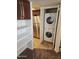 Convenient laundry closet with stackable washer and dryer, and ample storage in a well-lit area at 1333 E Morten Ave # 230, Phoenix, AZ 85020