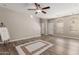 Open-concept living area with hardwood floors, neutral decor, and plenty of natural light at 1350 S Greenfield Rd # 1125, Mesa, AZ 85206
