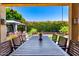 Covered patio with an inviting dining table and well-manicured backyard with gazebo at 1361 N Claiborne --, Mesa, AZ 85205