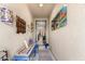 Stylish foyer featuring textured walls, a console table, and decorative wall art at 1361 N Claiborne --, Mesa, AZ 85205