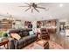 Open-concept living room and kitchen with hardwood floors and plenty of natural light at 1361 N Claiborne --, Mesa, AZ 85205