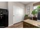 Home office showing a safe and desk storage in a naturally lit space at 1361 N Claiborne --, Mesa, AZ 85205