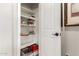 Organized pantry with white shelving, offering ample storage at 1361 N Claiborne --, Mesa, AZ 85205