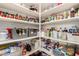 Walk-in pantry with lots of shelving perfect for food storage and organization at 1361 N Claiborne --, Mesa, AZ 85205