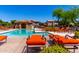 Inviting community pool with comfortable lounge chairs for relaxing and enjoying the sun at 1361 N Claiborne --, Mesa, AZ 85205