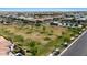 Community park with green space, walking path and swimming pool at 14634 W Wethersfield Rd, Surprise, AZ 85379