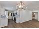 Open-concept kitchen boasts white cabinetry, modern appliances, and ample counter space at 1529 E Edgemont Ave, Phoenix, AZ 85006