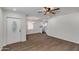Inviting living room with wood-look floors that flows seamlessly into the adjacent updated kitchen at 1529 E Edgemont Ave, Phoenix, AZ 85006
