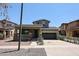 Charming two-story home featuring a welcoming front porch and a two-car garage at 15365 W Valentine St, Surprise, AZ 85379