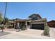 Charming two-story home featuring a welcoming front porch and a two-car garage at 15365 W Valentine St, Surprise, AZ 85379