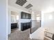 Upstairs hallway featuring dark cabinets, and carpet flooring at 15365 W Valentine St, Surprise, AZ 85379