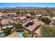An aerial view of beautiful homes with private pools, patios, landscaping, solar panels and mountain views at 15829 S 13Th Pl, Phoenix, AZ 85048