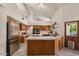 Updated kitchen featuring wood cabinets, tile countertops, stainless steel appliances and natural lighting at 15829 S 13Th Pl, Phoenix, AZ 85048