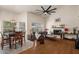 Inviting living room with hardwood floors, vaulted ceiling, and a fireplace, perfect for relaxing and entertaining guests at 15829 S 13Th Pl, Phoenix, AZ 85048