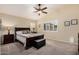 Cozy bedroom with plantation shutters, neutral decor, and ample natural light, creating a serene retreat at 16055 S 18Th Dr, Phoenix, AZ 85045