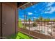Balcony with artificial turf, metal railing and neighborhood views at 16602 N 25Th St # 223, Phoenix, AZ 85032