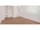 Bedroom with built-in shelving, plush carpet, and neutral paint at 16602 N 25Th St # 223, Phoenix, AZ 85032