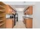 Well-lit kitchen with ample cabinet space, modern appliances, and a functional layout for easy meal preparation at 16602 N 25Th St # 223, Phoenix, AZ 85032