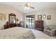 Charming bedroom with a sliding glass door leading to the pool area at 17030 N 57Th St, Scottsdale, AZ 85254