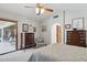 Bright bedroom with traditional furniture and a sliding glass door at 17030 N 57Th St, Scottsdale, AZ 85254