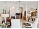 Open living room featuring a fireplace, wet bar, and comfortable seating area at 17030 N 57Th St, Scottsdale, AZ 85254