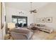 Comfortable living room area features tile floors, large windows, and cozy seating at 17030 N 57Th St, Scottsdale, AZ 85254