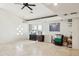 Bright living room with tile floors, storage, and natural light streaming through large windows at 17030 N 57Th St, Scottsdale, AZ 85254