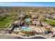 Aerial view showcases the community's multiple pools and meticulously designed recreational facilities at 17303 N 98Th Pl, Scottsdale, AZ 85255