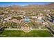Panoramic aerial view of the community's luxurious pool area and well-manicured landscaping at 17303 N 98Th Pl, Scottsdale, AZ 85255
