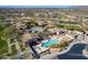 Aerial view captures the community's pools, recreational amenities, and landscaped grounds at 17303 N 98Th Pl, Scottsdale, AZ 85255