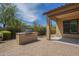 Outdoor kitchen with a built-in stainless steel grill and a stone counter at 17303 N 98Th Pl, Scottsdale, AZ 85255