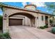 Exterior elevation shows a two-story home with a barrel tile roof and an arched portico at 18500 N 95Th St, Scottsdale, AZ 85255