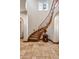 Welcoming foyer boasts a curved staircase, tile accents, and travertine flooring at 18500 N 95Th St, Scottsdale, AZ 85255