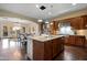 Well-designed kitchen featuring custom cabinets, stainless steel appliances, and a granite island at 18500 N 95Th St, Scottsdale, AZ 85255